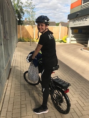 Woman and her bike going to work at L & D hospital