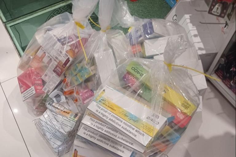 Bag of seized illegal tobacco products. 