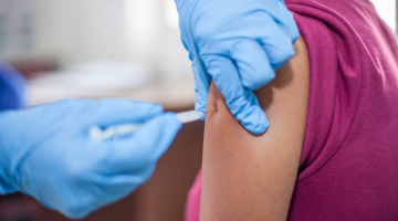 person getting vaccine